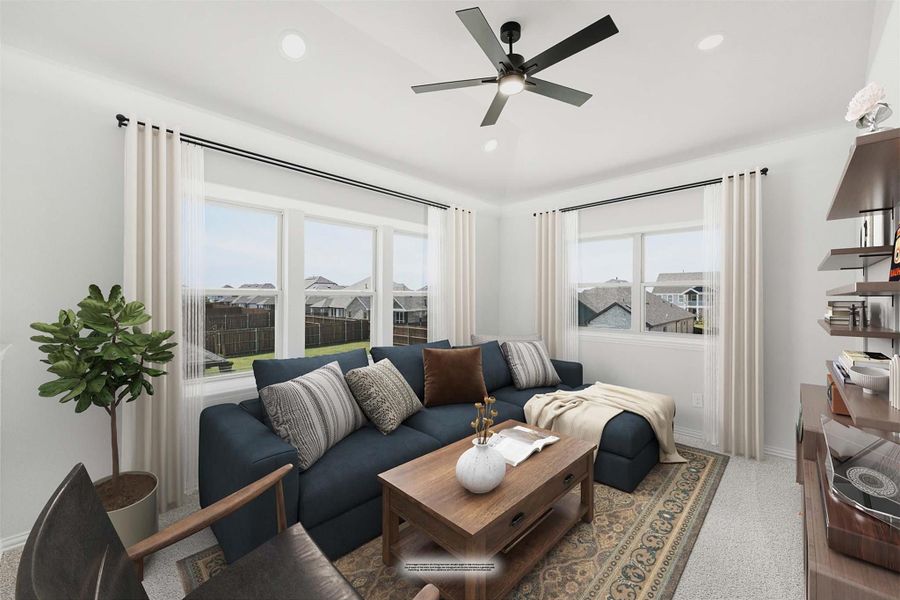 Living room with navy sectional sofa, wood coffee table, ceiling fan, and large windows with neighborhood views Living room with navy sectional sofa, wood coffee table, ceiling fan, and large windows with neighborhood views