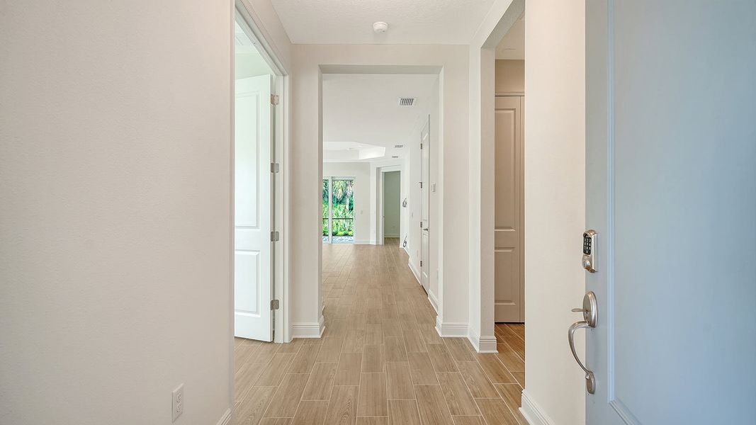 Spacious, unfurnished interior of a new home in Wildleaf Real Estate and Homes for Sale in Parrish, FL - Neal Communities, Parrish (Image 17). Spacious, unfurnished interior of a new home in Wildleaf Real Estate and Homes for Sale in Parrish, FL - Neal Communities, Parrish (Image 17).