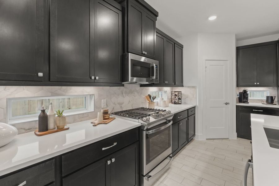 Representative furnished interior of a home built from the Rosewood by Chesmar Homes in Balmoral, Humble (Image 8).