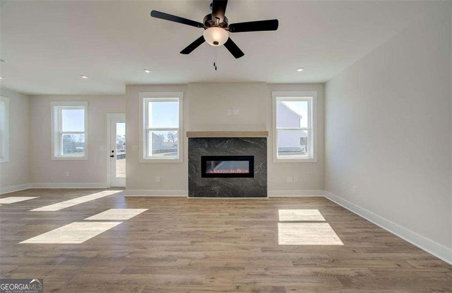 Spacious, unfurnished interior of a new home in The Paddocks at Doc Hughes, Buford (Image 50).