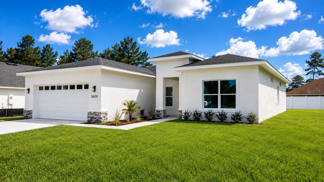 Front exterior of a new home in , Ocala, FL, highlighting curb appeal (Image 19).