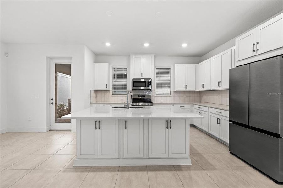 Furnished interior view inside a new home in Harvest At Ovation 50s, Winter Garden (Image 5).