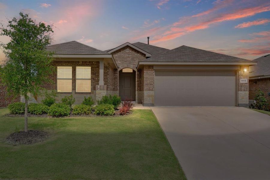 Front exterior of a new home in Cambridge Brook, Denton, TX, highlighting curb appeal (Image 2). Front exterior of a new home in Cambridge Brook, Denton, TX, highlighting curb appeal (Image 2).