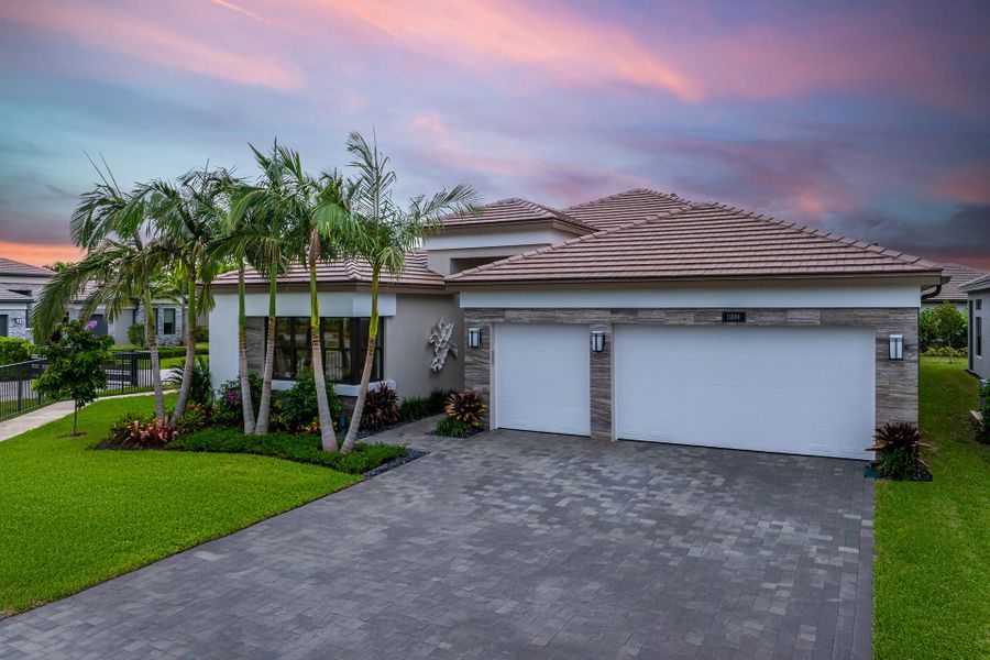 Representative exterior photo of a completed home built from the Julia by GL Homes in Valencia Del Mar (55+), Boynton Beach, FL (Image 2).