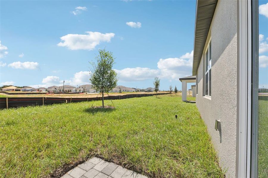 Exterior details and patio area of a home in Crosswinds - Signature Series, Haines City (Image 27).
