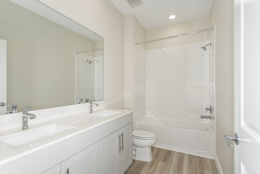 Furnished interior view inside a new home in Pasadena Woods, Wesley Chapel (Image 11). Furnished interior view inside a new home in Pasadena Woods, Wesley Chapel (Image 11).
