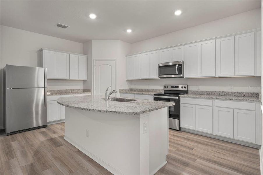 Furnished interior view inside a new home in , Poinciana (Image 4).