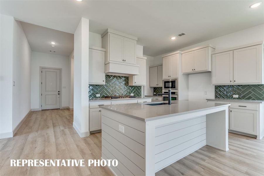 Style and sophistication abound in this dream kitchen!  REPRESENTATIVE PHOTO