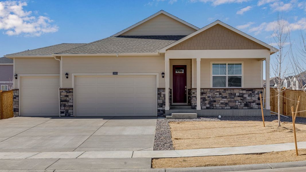 Front exterior of a new home in Lakeside Canyon, Mead, CO, highlighting curb appeal (Image 1). Front exterior of a new home in Lakeside Canyon, Mead, CO, highlighting curb appeal (Image 1).