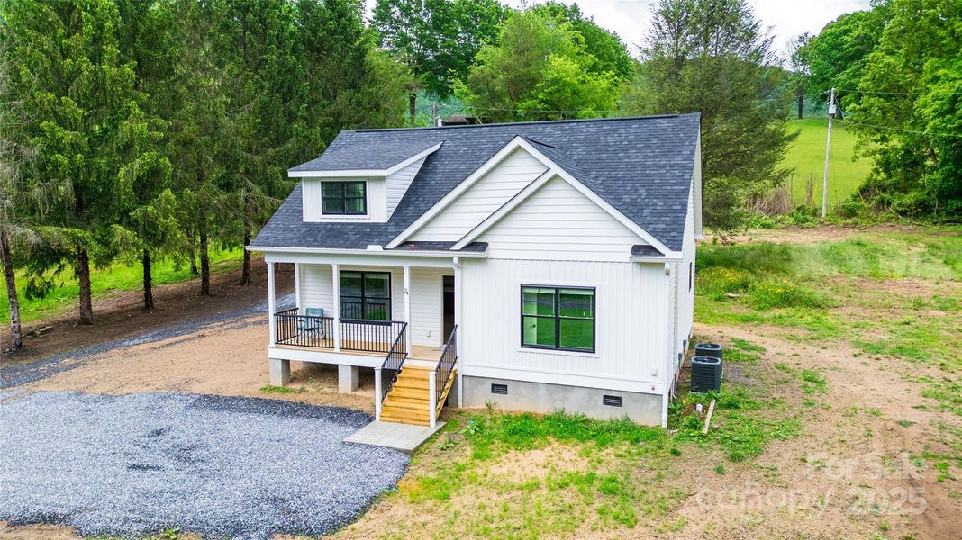 Front exterior of a new home in , Tuckasegee, NC, highlighting curb appeal (Image 17).
