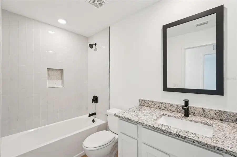 Furnished interior view inside a new home in Port Charlotte, North Port (Image 9).