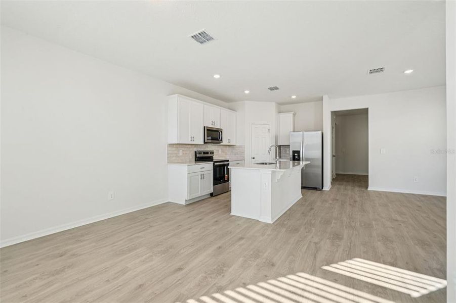 Furnished interior view inside a new home in The Meadow at Crossprairie Bungalows, St. Cloud (Image 40).