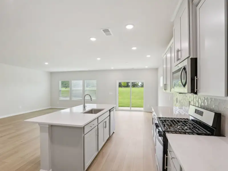 Furnished interior view inside a new home in River Glen, Angier (Image 4).