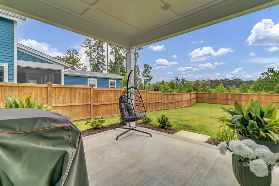 Exterior details and patio area of a home in Midtown at Nexton, Summerville (Image 28).