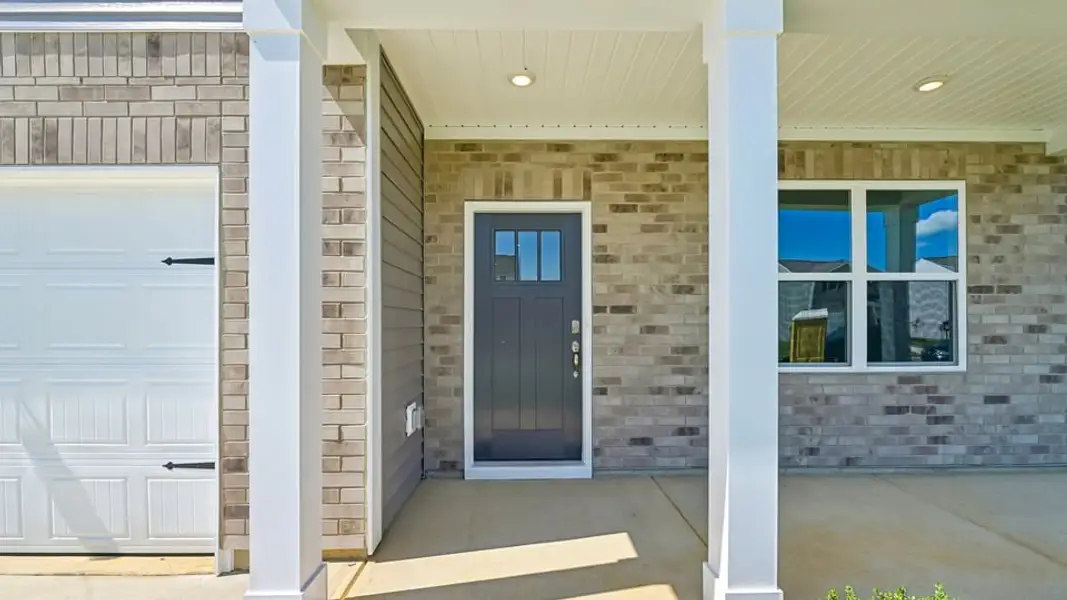 Exterior details and patio area of a home in Shahbain Reserve, Raeford (Image 4). Exterior details and patio area of a home in Shahbain Reserve, Raeford (Image 4).