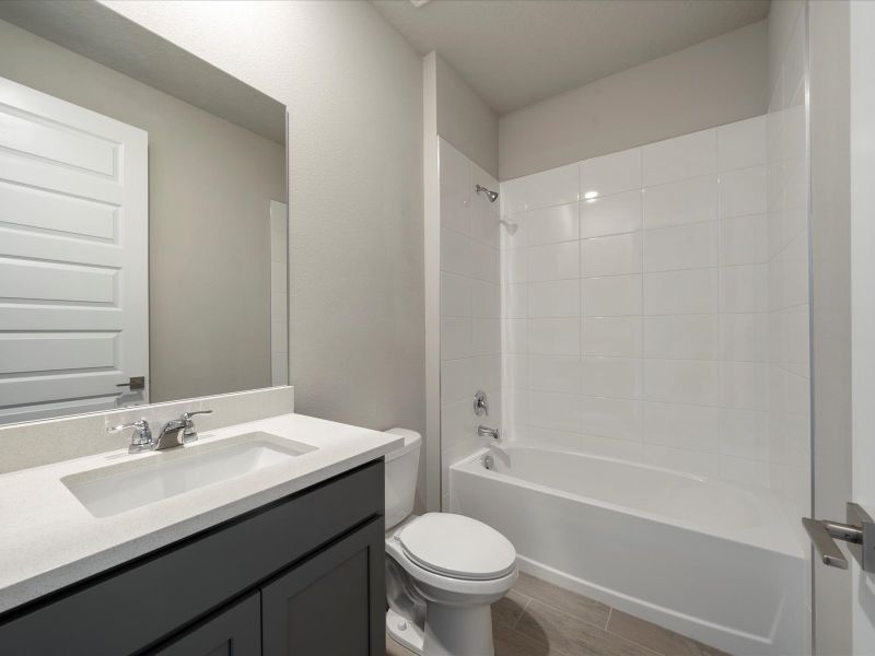 Bathroom in the Onyx floorplan at 6383 NW Sweetwood Drive in Brystol at Wylder