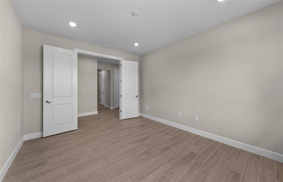 Spacious, unfurnished interior of a new home in Arbor Oaks, North Port (Image 13).