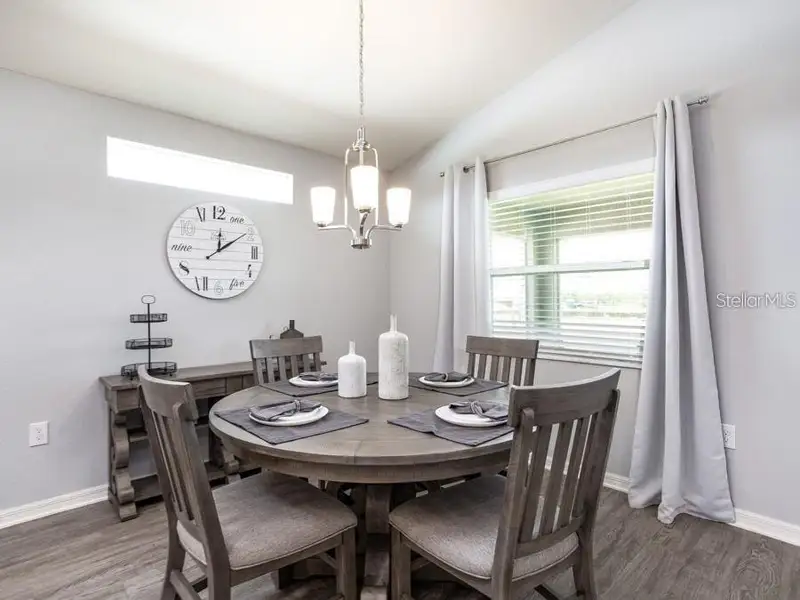 Furnished interior view inside a new home in Estates at Hickory Cove - Single-Family Homes, St. Cloud (Image 6).