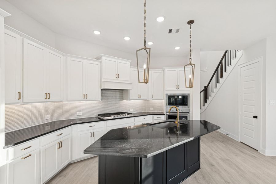 Furnished interior view inside a new home in The Highlands - Grove Collection, Porter (Image 17).