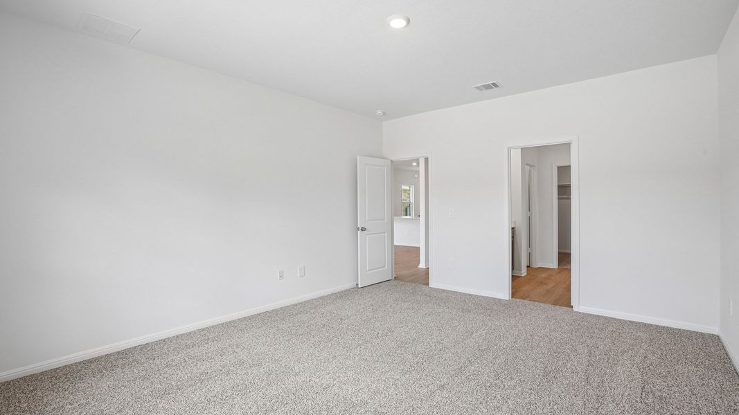 Spacious, unfurnished interior of a new home in Bar W Ranch, Leander (Image 24).