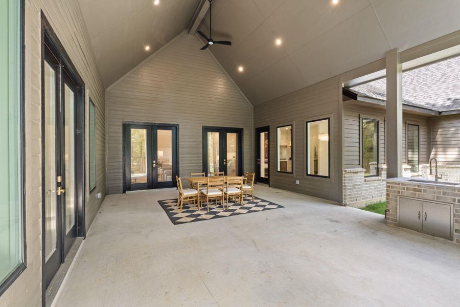 The built-in outdoor kitchen is ready for weekend cookouts with 3 entry points from the main living room, gameroom and breakfast room.
