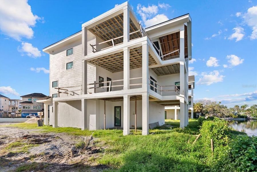 Exterior details and patio area of a home in , Sarasota (Image 3).