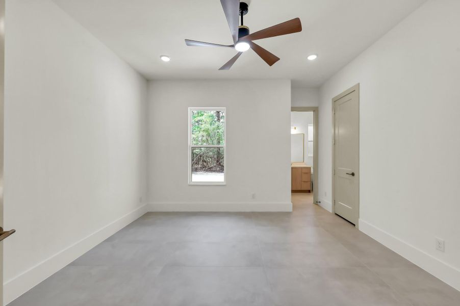 Well-appointed secondary bedrooms offer comfort, privacy, and flexibility for family or guests.