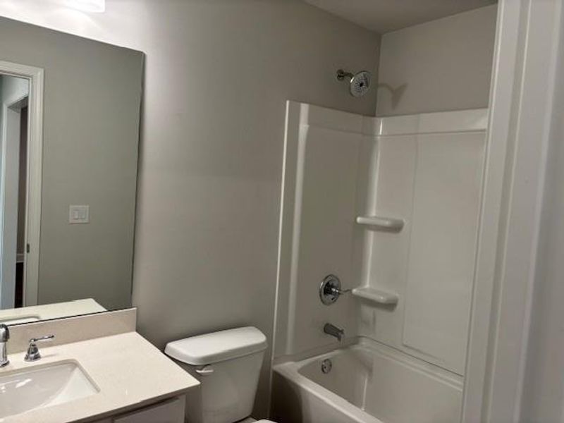 Furnished interior view inside a new home in , Suwanee (Image 7).