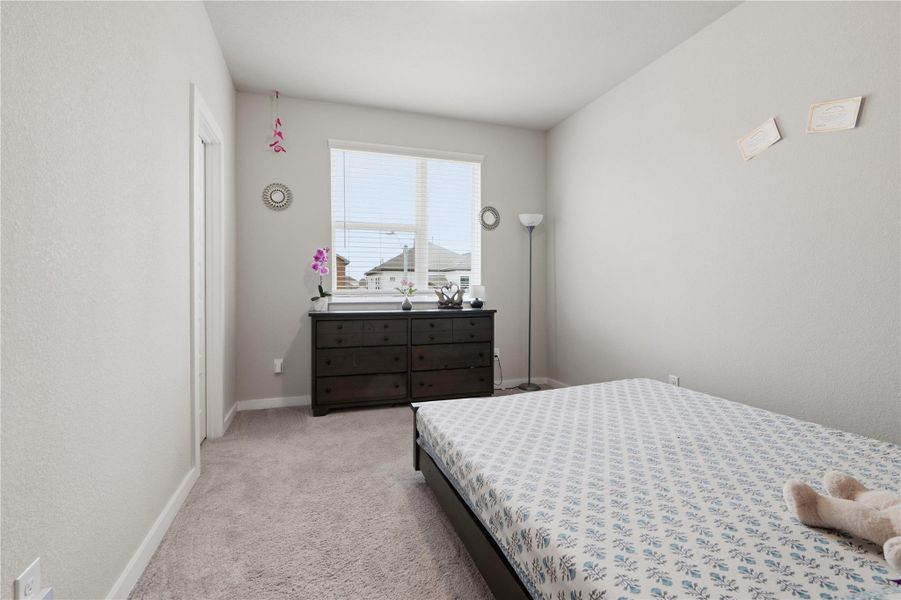 Furnished interior view inside a new home in University Heights, Round Rock (Image 17).