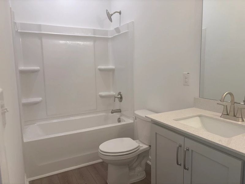 Bath 2 featuring the AW Collection® Milan - Stylish finishes and dramatic contrast throughout.