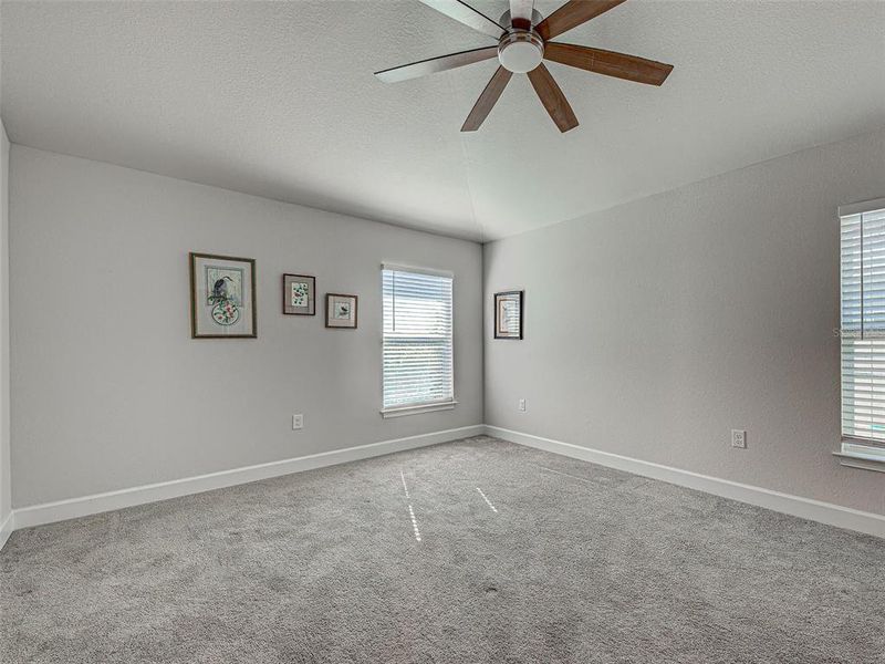 Spacious, unfurnished interior of a new home in Watercress Cove, North Port (Image 36).