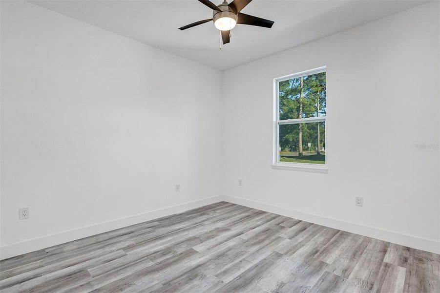 Spacious, unfurnished interior of a new home in , New Smyrna Beach (Image 25).