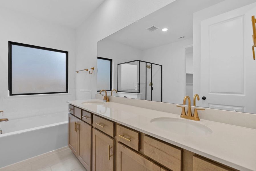 Primary bathroom. Sample product photo. Actual exterior and interior selections may vary by homesite. Photo may be virtually staged.