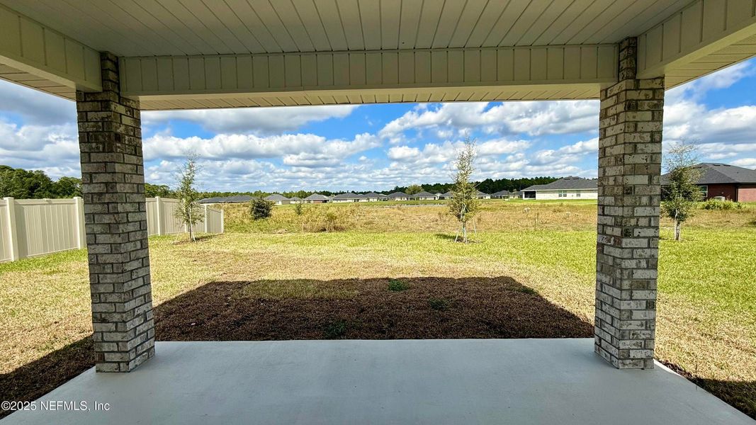 Exterior details and patio area of a home in Shadow Crest at Rolling Hills, Green Cove Springs (Image 3).