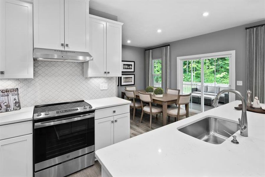 Representative furnished interior of a home built from the Roanoke by Ryan Homes in Muirwood, Murfreesboro (Image 7).