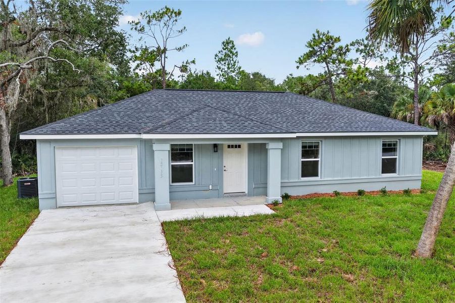 Front exterior of a new home in , Ocala, FL, highlighting curb appeal (Image 1). Front exterior of a new home in , Ocala, FL, highlighting curb appeal (Image 1).