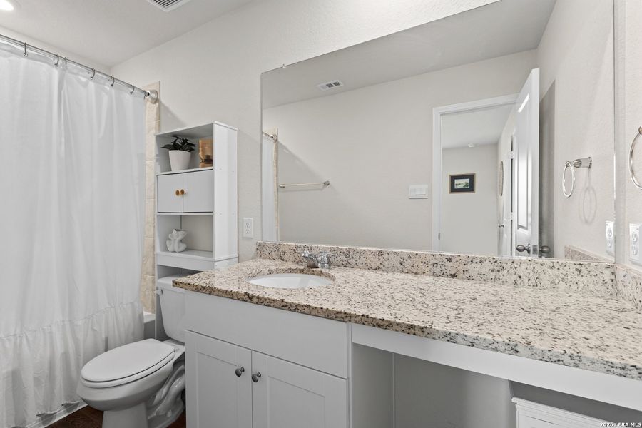 Furnished interior view inside a new home in , San Antonio (Image 12).