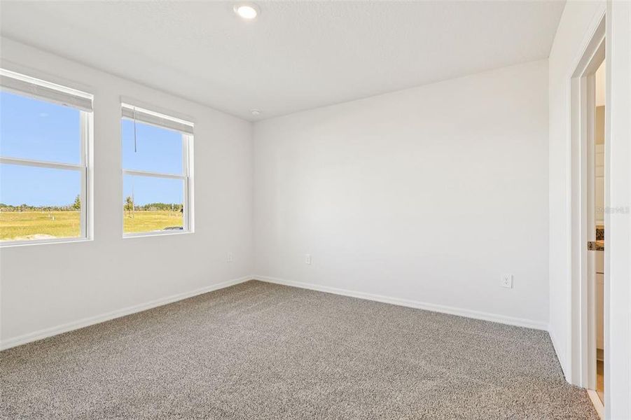 Spacious, unfurnished interior of a new home in Springs at Lake Alfred - Classic Series, Lake Alfred (Image 28).