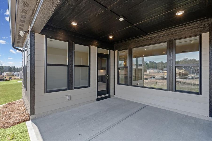 Exterior details and patio area of a home in Twin Lakes, Hoschton (Image 28).