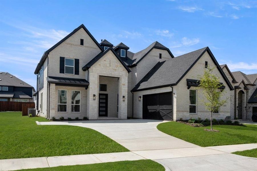 Front exterior of a new home in Birdsong, Mansfield, TX, highlighting curb appeal (Image 17). Front exterior of a new home in Birdsong, Mansfield, TX, highlighting curb appeal (Image 17).