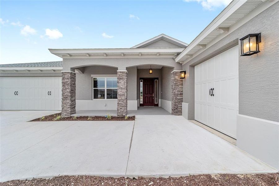 Exterior details and patio area of a home in On Top of the World Communities, Ocala (Image 22).