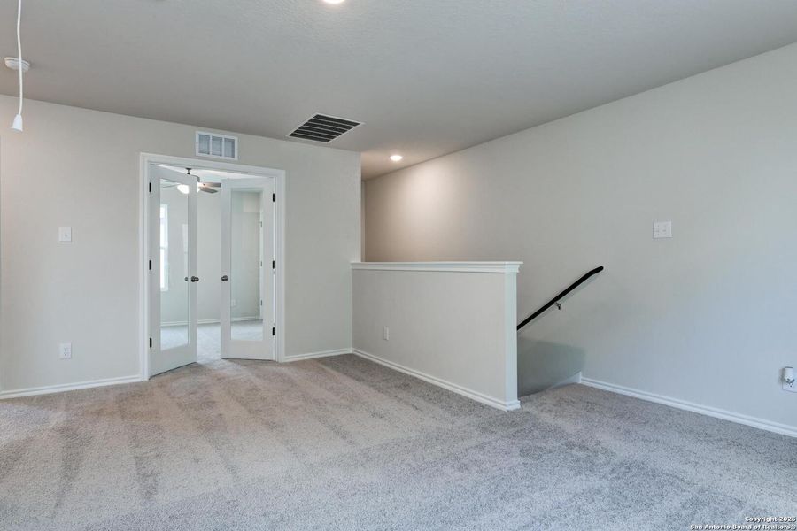Spacious, unfurnished interior of a new home in Meadows at Hennersby Hollow 40's, San Antonio (Image 32).