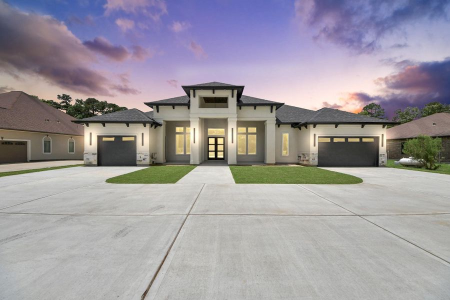 Front exterior of a new home in , Porter, TX, highlighting curb appeal (Image 2). Front exterior of a new home in , Porter, TX, highlighting curb appeal (Image 2).