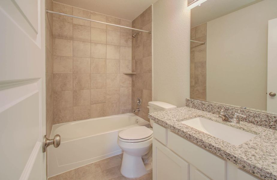 Furnished interior view inside a new home in Legends Bay, Baytown (Image 11).