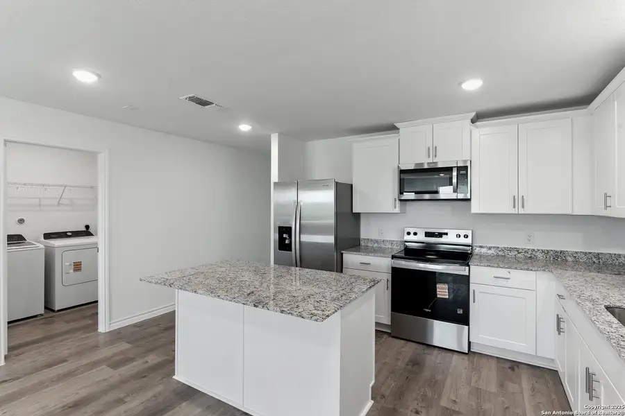 Furnished interior view inside a new home in Vista Real, Converse (Image 2).