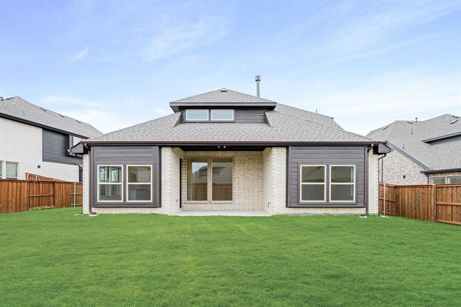 Exterior details and patio area of a home in Windsong Ranch Classic 61, Prosper (Image 4).