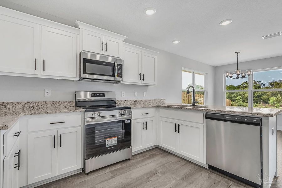 Furnished interior view inside a new home in Allison Acres, Cantonment (Image 7).