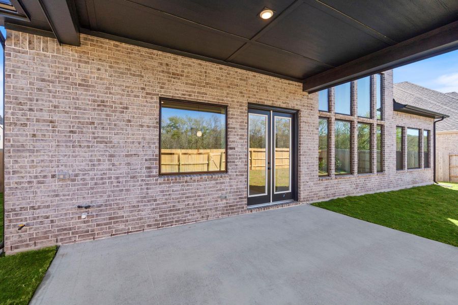 Exterior details and patio area of a home in Fulbrook on Fulshear Creek 60', Fulshear (Image 16). Exterior details and patio area of a home in Fulbrook on Fulshear Creek 60', Fulshear (Image 16).