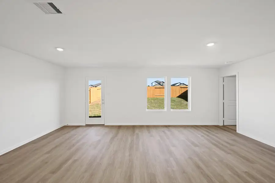 Spacious, unfurnished interior of a new home in The Canopies, Splendora (Image 11).