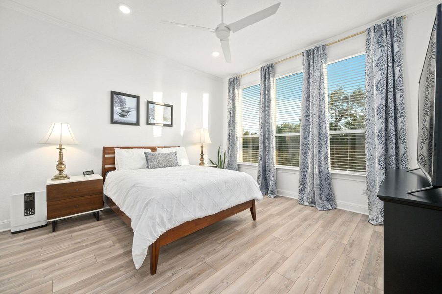 The spacious primary suite is separated from the secondary bedrooms offering a private and peaceful retreat overlooking the backyard The spacious primary suite is separated from the secondary bedrooms offering a private and peaceful retreat overlooking the backyard